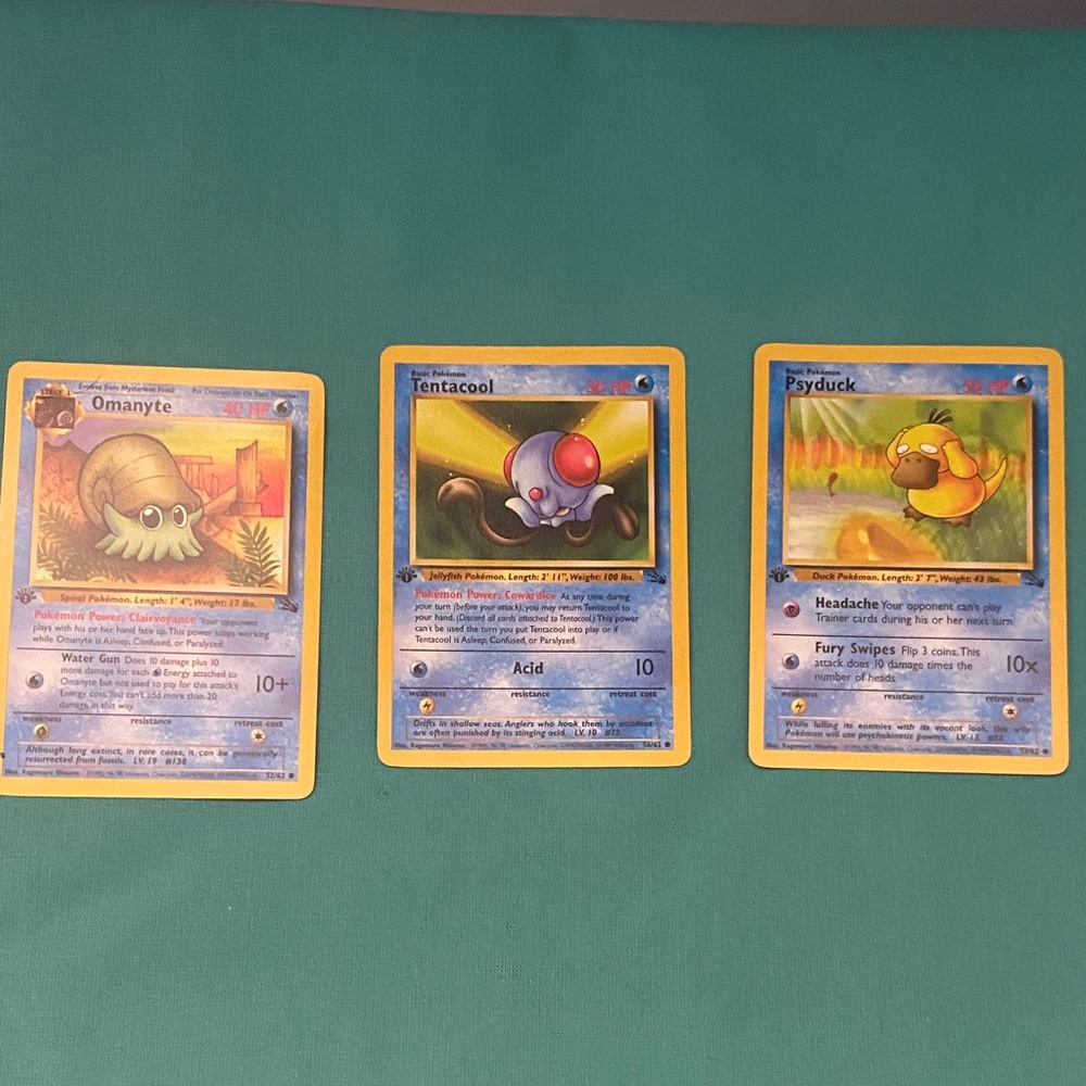 Vintage Pokémon first edition Omanyte, Tentacool & Psyduck Cards